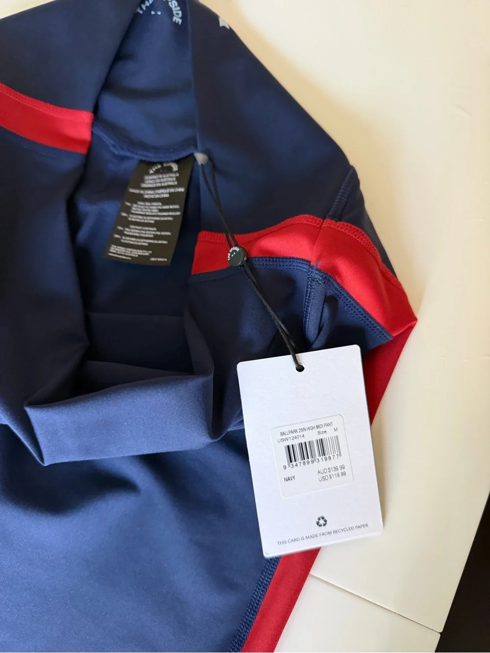The Upside Navy Leggings with Red and White Side Stripes